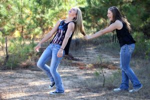 two teen girls laughing 